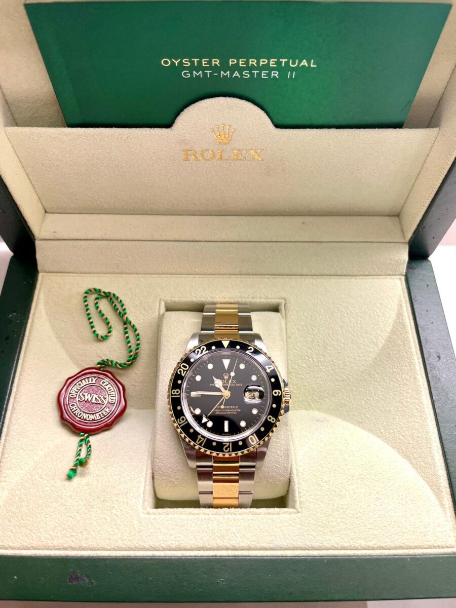 Rolex GMT Master II Stainless Steel / Yellow Gold 40mm Oyster Black Dial Ceramic Bezel A Serial - Pre-Owned Ref. 16713LN
